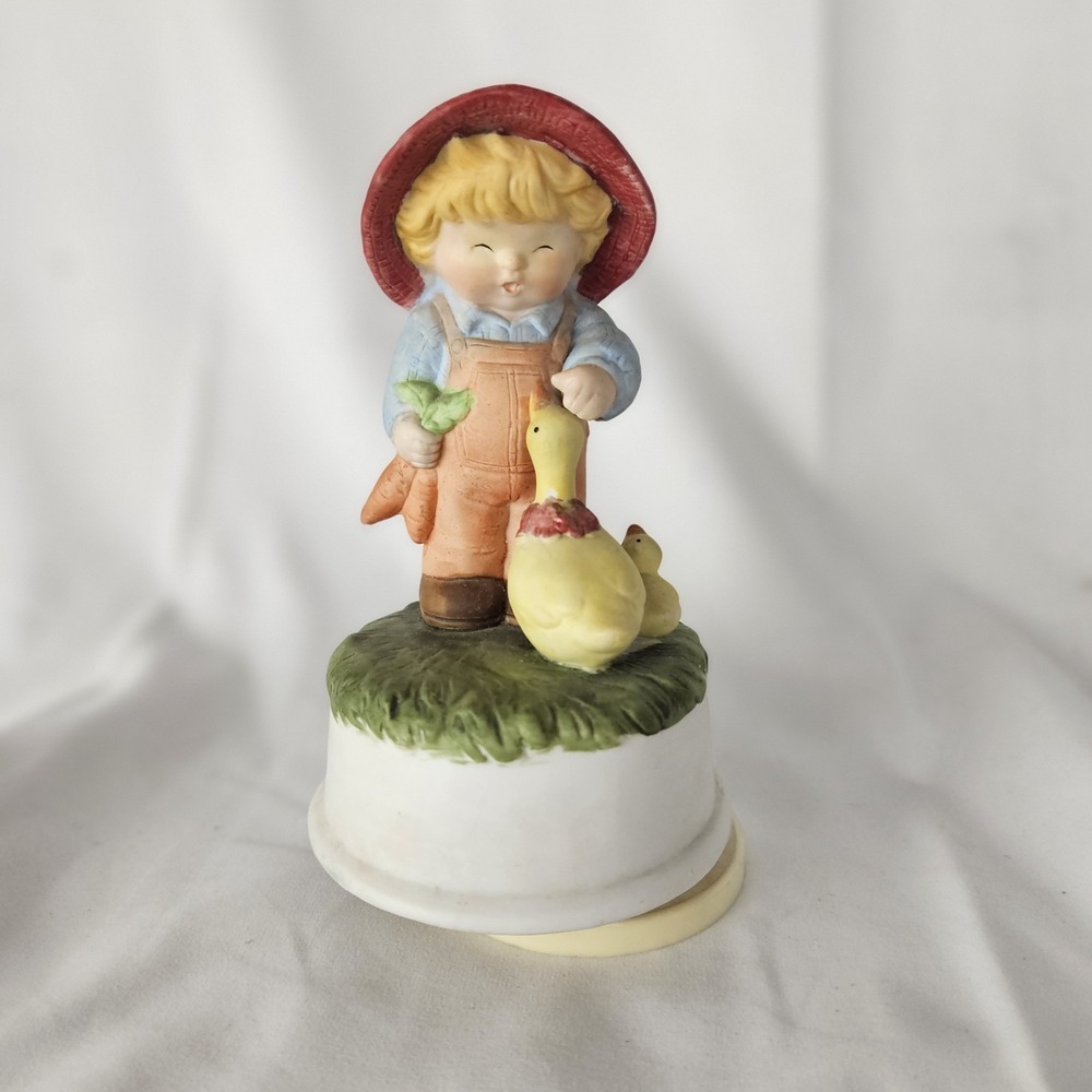 Little Boy Musical Figurine